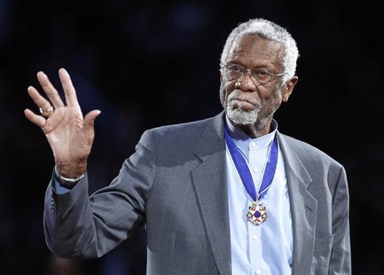 Boston Celtics' legend Bill Russell stands with his Presidential Medal of Freedom during the NBA All-Star basketball game in Los Angeles, in Boston Celtics' legend Bill Russell stands with his Presidential Medal of Freedom during the NBA All-Star basketball game in Los Angeles, in