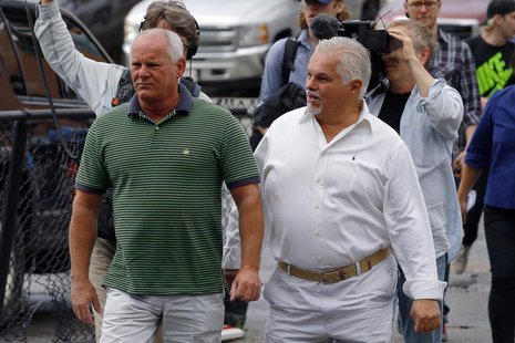 Stephen Rakes (L) and Stephen Davis arrive for the first day of the trial of accused mob boss James "Whitey" Bulger at the U.S. Federal Cour Stephen Rakes (L) and Stephen Davis arrive for the first day of the trial of accused mob boss James "Whitey" Bulger at the U.S. Federal Cour