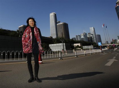 U.S. producer Janet Yang poses during an interview with Reuters in Beijing October 19, 2013. REUTERS/Kim Kyung-Hoon U.S. producer Janet Yang poses during an interview with Reuters in Beijing October 19, 2013. REUTERS/Kim Kyung-Hoon