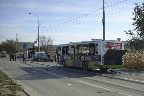 Members of Russia's emergency services work near a damaged bus after a bomb blast in Volgograd in this handout provided by the Russian Emerg Members of Russia's emergency services work near a damaged bus after a bomb blast in Volgograd in this handout provided by the Russian Emerg