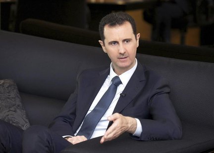 Syria's President Bashar al-Assad speaks during an interview with German magazine Der Spiegel in Damascus, in this handout photograph distri Syria's President Bashar al-Assad speaks during an interview with German magazine Der Spiegel in Damascus, in this handout photograph distri