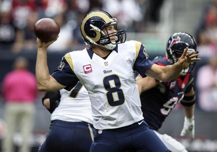 Oct 13, 2013; Houston, TX, USA; St. Louis Rams quarterback Sam Bradford (8) attempts a pass during the second quarter against the Houston Te Oct 13, 2013; Houston, TX, USA; St. Louis Rams quarterback Sam Bradford (8) attempts a pass during the second quarter against the Houston Te