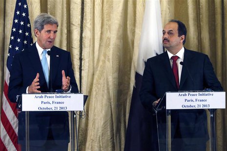 U.S. Secretary of State John Kerry (L) and Qatar's Foreign Minister Khalid bin Mohamed al-Attiyah (R) attend a news conference at the U.S. A U.S. Secretary of State John Kerry (L) and Qatar's Foreign Minister Khalid bin Mohamed al-Attiyah (R) attend a news conference at the U.S. A