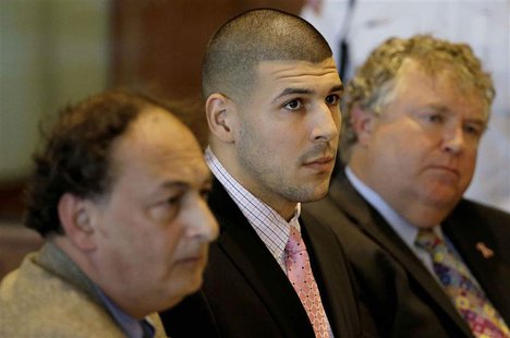 Former New England Patriots NFL football playerAaron Hernandez, (C), sits with his attorneys James Sultan (L) and Michael Fee in Bristol Sup Former New England Patriots NFL football playerAaron Hernandez, (C), sits with his attorneys James Sultan (L) and Michael Fee in Bristol Sup