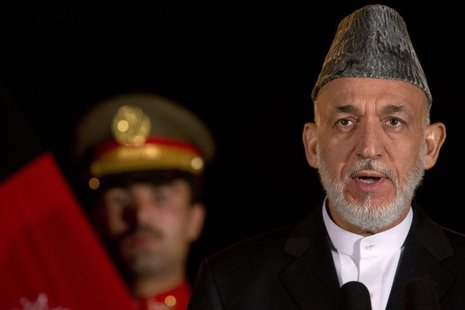 Afghan President Hamid Karzai speaks during a news conference with U.S. Secretary of State John Kerry (not pictured) at the Presidential Pal Afghan President Hamid Karzai speaks during a news conference with U.S. Secretary of State John Kerry (not pictured) at the Presidential Pal