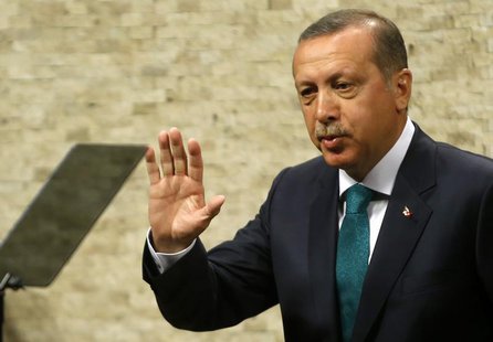 Turkish Prime Minister Tayyip Erdogan waves as he leaves a news conference in Ankara September 30, 2013. REUTERS/Umit Bektas Turkish Prime Minister Tayyip Erdogan waves as he leaves a news conference in Ankara September 30, 2013. REUTERS/Umit Bektas