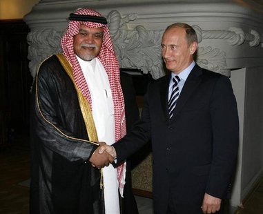 Prince Bandar bin Sultan (L), Secretary-General of Saudi Arabia's National Security Council, shakes hands with Russia's Prime Minister Vladi Prince Bandar bin Sultan (L), Secretary-General of Saudi Arabia's National Security Council, shakes hands with Russia's Prime Minister Vladi