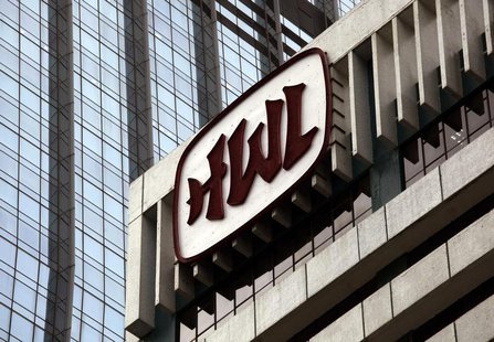 The logo of Hutchison Whampoa Ltd is displayed at one of the company's office towers in Hong Kong August 1, 2013. REUTERS/Bobby Yip The logo of Hutchison Whampoa Ltd is displayed at one of the company's office towers in Hong Kong August 1, 2013. REUTERS/Bobby Yip