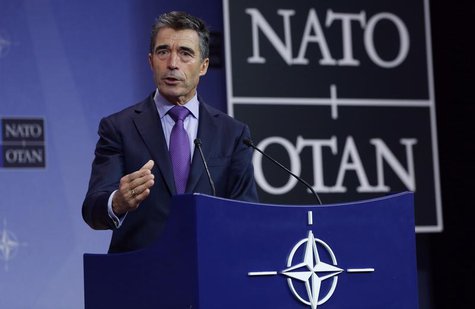 NATO Secretary-General Anders Fogh Rasmussen holds a news conference during a NATO defence ministers meeting at the Alliance headquarters in NATO Secretary-General Anders Fogh Rasmussen holds a news conference during a NATO defence ministers meeting at the Alliance headquarters in