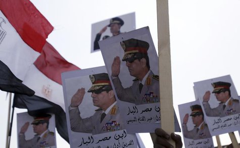 Posters of Army Chief General Abdel Fattah al-Sisi are seen as supporters of the army protest against ousted Islamist President Mohamed Murs Posters of Army Chief General Abdel Fattah al-Sisi are seen as supporters of the army protest against ousted Islamist President Mohamed Murs