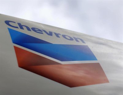 A Chevron gas station sign is pictured at one of their retain gas stations in Cardiff, California October 9, 2013. REUTERS/Mike Blake A Chevron gas station sign is pictured at one of their retain gas stations in Cardiff, California October 9, 2013. REUTERS/Mike Blake