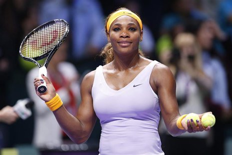 Serena Williams of the U.S. throws balls to spectators after her WTA tennis championships match against Angelique Kerber of Germany at Sinan Serena Williams of the U.S. throws balls to spectators after her WTA tennis championships match against Angelique Kerber of Germany at Sinan