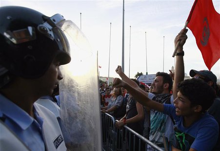 Protesters shout slogans during a demonstration calling for the departure of the Islamist-led ruling coalition in at Kasbah Square where the Protesters shout slogans during a demonstration calling for the departure of the Islamist-led ruling coalition in at Kasbah Square where the