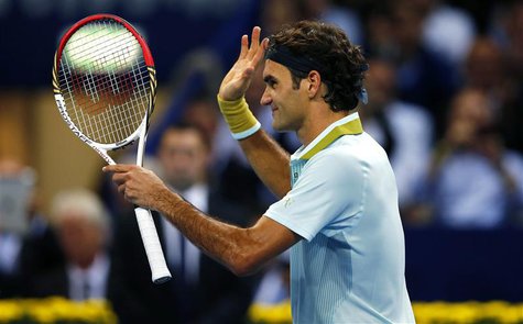 Switzerland's Roger Federer reacts after winning his match against Adrian Mannarino of France at the Swiss Indoors ATP tennis tournament in Switzerland's Roger Federer reacts after winning his match against Adrian Mannarino of France at the Swiss Indoors ATP tennis tournament in