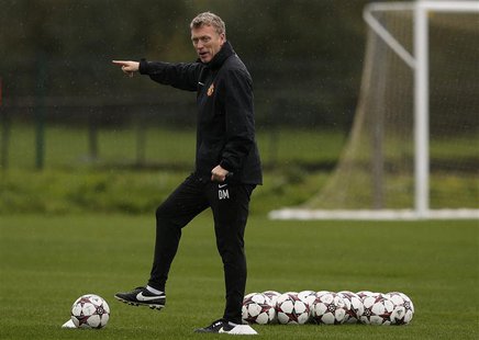 Manchester United's manager David Moyes gestures during a training session at the club's Carrington training complex in Manchester, northern Manchester United's manager David Moyes gestures during a training session at the club's Carrington training complex in Manchester, northern