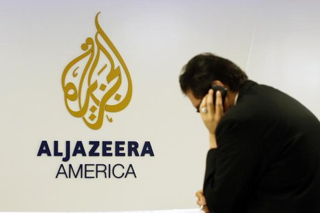 A man works at a desk in the Al Jazeera America broadcast center in New York, August 20, 2013. REUTERS/Brendan McDermid A man works at a desk in the Al Jazeera America broadcast center in New York, August 20, 2013. REUTERS/Brendan McDermid