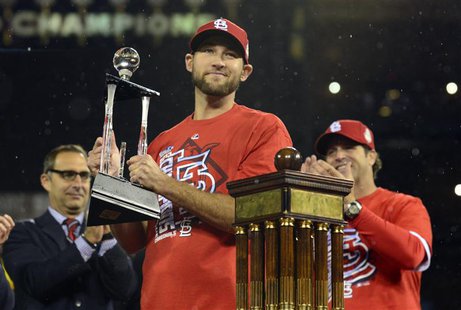 Oct 18, 2013; St. Louis, MO, USA; St. Louis Cardinals starting pitcher Michael Wacha holds the series MVP trophy after game six of the Natio Oct 18, 2013; St. Louis, MO, USA; St. Louis Cardinals starting pitcher Michael Wacha holds the series MVP trophy after game six of the Natio