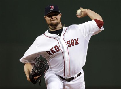 Oct 23, 2013; Boston, MA, USA; Boston Red Sox starting pitcher Jon Lester throws a pitch against the St. Louis Cardinals in the first inning Oct 23, 2013; Boston, MA, USA; Boston Red Sox starting pitcher Jon Lester throws a pitch against the St. Louis Cardinals in the first inning