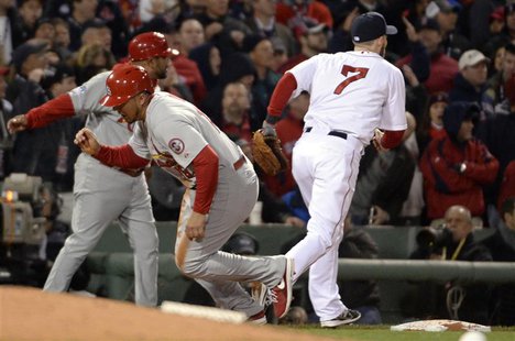 Oct 24, 2013; Boston, MA, USA; St. Louis Cardinals center fielder Jon Jay (19) gets up and runs home to score a run after the ball gets away Oct 24, 2013; Boston, MA, USA; St. Louis Cardinals center fielder Jon Jay (19) gets up and runs home to score a run after the ball gets away