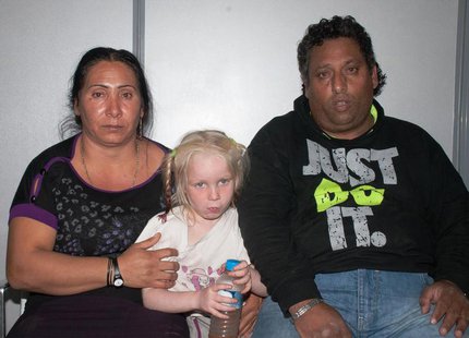 Forty year-old Roma woman by the name Selini Sali or Eleftheria Dimolpoulou, 39 year-old Roma man by the name Christos Salis (R) and a girl Forty year-old Roma woman by the name Selini Sali or Eleftheria Dimolpoulou, 39 year-old Roma man by the name Christos Salis (R) and a girl