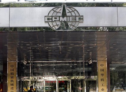 A security guard stands at an entrance to the headquarters of China Precision Machinery Import and Export Corp (CPMIEC) at its headquarters A security guard stands at an entrance to the headquarters of China Precision Machinery Import and Export Corp (CPMIEC) at its headquarters
