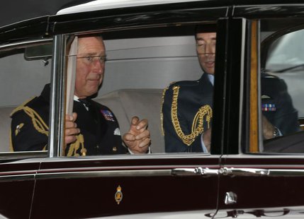 Britain's Prince Charles (L) arrives for the christening of Prince George at St James's Palace in London October 23, 2013. REUTERS/Olivia Ha Britain's Prince Charles (L) arrives for the christening of Prince George at St James's Palace in London October 23, 2013. REUTERS/Olivia Ha
