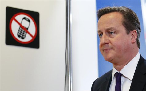 Britain's Prime Minister David Cameron leaves a news conference during a European Union leaders summit in Brussels October 25, 2013. REUTERS Britain's Prime Minister David Cameron leaves a news conference during a European Union leaders summit in Brussels October 25, 2013. REUTERS