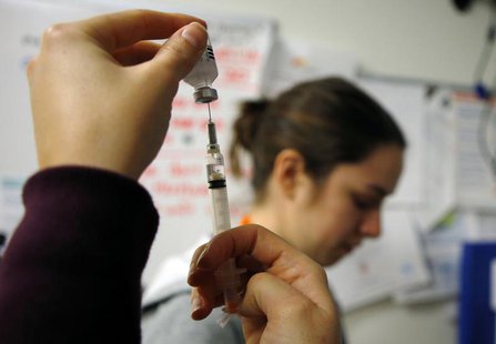 Nurses prepare influenza vaccine injections during a flu shot clinic at Dorchester House, a health care clinic, in Boston, Massachusetts Jan Nurses prepare influenza vaccine injections during a flu shot clinic at Dorchester House, a health care clinic, in Boston, Massachusetts Jan