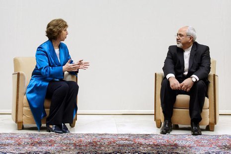 European Union foreign policy chief Catherine Ashton (L) speaks with Iranian Foreign Minister Mohammad Javad Zarif during a photo opportunit European Union foreign policy chief Catherine Ashton (L) speaks with Iranian Foreign Minister Mohammad Javad Zarif during a photo opportunit