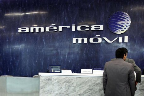 The logo of America Movil is seen on the wall of the reception area in the company's corporate offices in Mexico City February 13, 2013. REU The logo of America Movil is seen on the wall of the reception area in the company's corporate offices in Mexico City February 13, 2013. REU