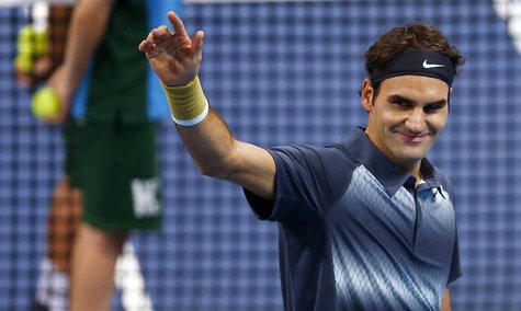 Switzerland's Roger Federer waves after winning his quarter final match against Grigor Dimitrov of Bulgaria at the Swiss Indoors ATP tennis Switzerland's Roger Federer waves after winning his quarter final match against Grigor Dimitrov of Bulgaria at the Swiss Indoors ATP tennis