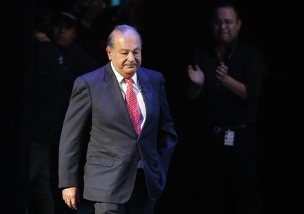 Mexican billionaire Carlos Slim walks on stage for an event of the Fundacion Telmex Mexico Siglo XXI (Telmex Foundation Mexico XXI Century) Mexican billionaire Carlos Slim walks on stage for an event of the Fundacion Telmex Mexico Siglo XXI (Telmex Foundation Mexico XXI Century)
