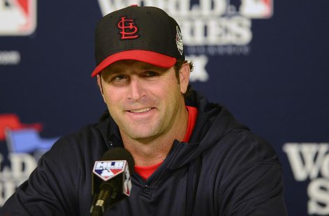 St. Louis Cardinals manager Mike Matheny (22) talks with the media during a press conference a day before game three of the World Series aga St. Louis Cardinals manager Mike Matheny (22) talks with the media during a press conference a day before game three of the World Series aga