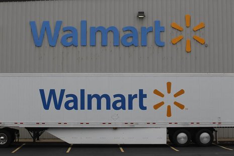 The Wal-Mart company logo is seen outside a Wal-Mart Stores Inc company distribution center in Bentonville, Arkansas June 6, 2013. REUTERS/R The Wal-Mart company logo is seen outside a Wal-Mart Stores Inc company distribution center in Bentonville, Arkansas June 6, 2013. REUTERS/R