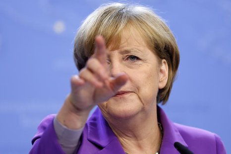 Germany's Chancellor Angela Merkel addresses a news conference during a European Union leaders summit in Brussels October 25, 2013. REUTERS/ Germany's Chancellor Angela Merkel addresses a news conference during a European Union leaders summit in Brussels October 25, 2013. REUTERS/