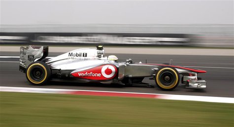 McLaren Formula One driver Sergio Perez of Mexico drives during the third practice session of the Indian F1 Grand Prix at the Buddh Internat McLaren Formula One driver Sergio Perez of Mexico drives during the third practice session of the Indian F1 Grand Prix at the Buddh Internat