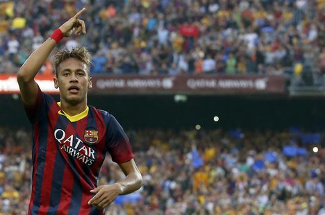 Barcelona's Neymar celebrates after scoring a goal against Real Madrid during their Spanish first division "Clasico" soccer match at Nou Cam Barcelona's Neymar celebrates after scoring a goal against Real Madrid during their Spanish first division "Clasico" soccer match at Nou Cam