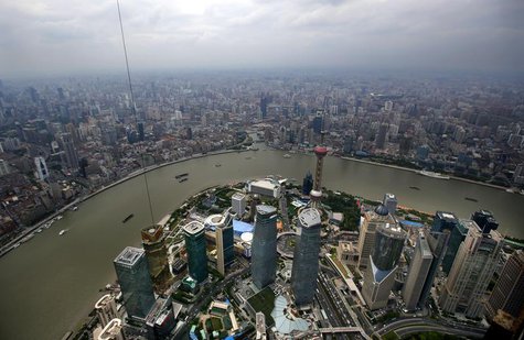 A general view of Shanghai's financial district of Pudong is seen from the top of the Shanghai Tower, which is undergoing construction, Augu A general view of Shanghai's financial district of Pudong is seen from the top of the Shanghai Tower, which is undergoing construction, Augu
