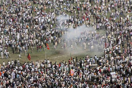 Smoke rises after a bomb exploded near a public ground where Gujarat's chief minister and Hindu nationalist Narendra Modi, the prime ministe Smoke rises after a bomb exploded near a public ground where Gujarat's chief minister and Hindu nationalist Narendra Modi, the prime ministe