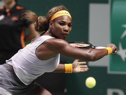 Serena Williams of the U.S. hits a return to Li Na of China during their WTA tennis championships final match at Sinan Erdem Dome in Istanbu Serena Williams of the U.S. hits a return to Li Na of China during their WTA tennis championships final match at Sinan Erdem Dome in Istanbu