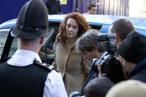 Former News International chief executive Rebekah Brooks arrives with her husband Charlie at the Old Bailey courthouse in London October 28, Former News International chief executive Rebekah Brooks arrives with her husband Charlie at the Old Bailey courthouse in London October 28,
