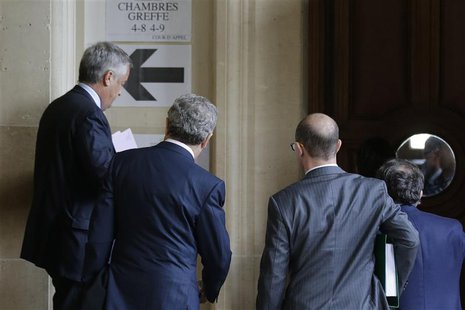 Former Vivendi head Jean-Marie Messier (L) arrives for the opening of an appeals trial at Paris courts, October 28, 2013. REUTERS/Jacky Naeg Former Vivendi head Jean-Marie Messier (L) arrives for the opening of an appeals trial at Paris courts, October 28, 2013. REUTERS/Jacky Naeg