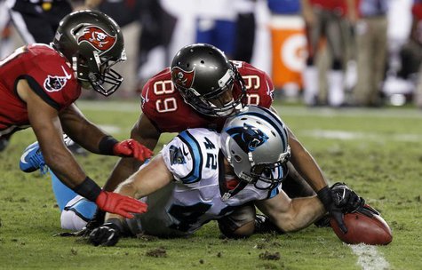 Oct 24, 2013; Tampa, FL, USA; Carolina Panthers defensive back Colin Jones (42) grabs a fumble from Tampa Bay Buccaneers wide receiver Eric Oct 24, 2013; Tampa, FL, USA; Carolina Panthers defensive back Colin Jones (42) grabs a fumble from Tampa Bay Buccaneers wide receiver Eric