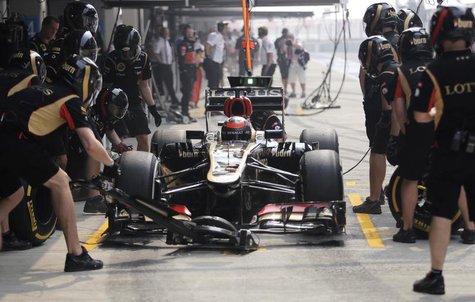 Lotus F1 Formula One driver Kimi Raikkonen of Finland is seen in his car during the third practice session of the Indian F1 Grand Prix at th Lotus F1 Formula One driver Kimi Raikkonen of Finland is seen in his car during the third practice session of the Indian F1 Grand Prix at th