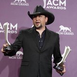 Jason Aldean poses with his awards for male vocalist of the year and vocal event of the year backstage at the 48th ACM Awards in Las Vegas, Jason Aldean poses with his awards for male vocalist of the year and vocal event of the year backstage at the 48th ACM Awards in Las Vegas,