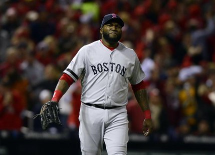 Boston Red Sox first baseman David Ortiz (34) reacts after the St. Louis Cardinals scored 2 runs during the seventh inning of game three of Boston Red Sox first baseman David Ortiz (34) reacts after the St. Louis Cardinals scored 2 runs during the seventh inning of game three of