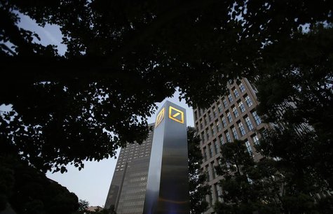 Logos of Deutsche Bank AG are seen in Tokyo September 9, 2013. REUTERS/Toru Hanai Logos of Deutsche Bank AG are seen in Tokyo September 9, 2013. REUTERS/Toru Hanai