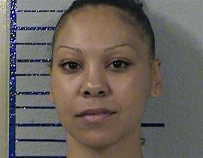 Sara Kruzan, 35, is seen in a handout photo from the California Department of Corrections taken July 8, 2013. REUTERS/California Department Sara Kruzan, 35, is seen in a handout photo from the California Department of Corrections taken July 8, 2013. REUTERS/California Department