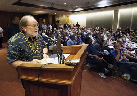 Hawaii Governor Neil Abercrombie reads a quote from the Dalai Lama as he gives testimony in support of same sex marriage during a Senate hea Hawaii Governor Neil Abercrombie reads a quote from the Dalai Lama as he gives testimony in support of same sex marriage during a Senate hea