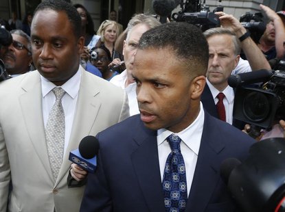 Jesse Jackson Jr. leaves his sentencing hearing in Washington, August 14, 2013. REUTERS/Jason Reed Jesse Jackson Jr. leaves his sentencing hearing in Washington, August 14, 2013. REUTERS/Jason Reed